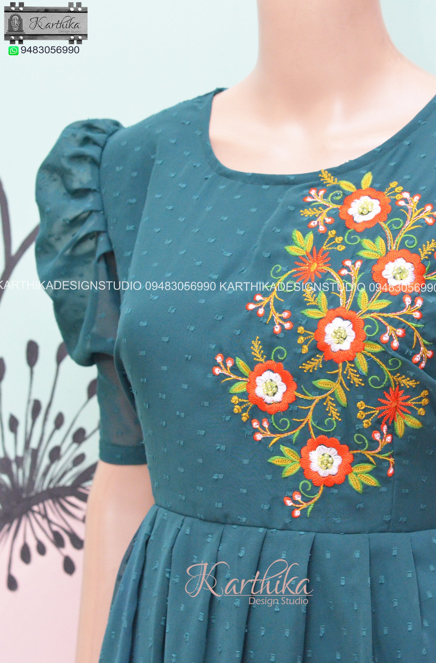 Bottle green embroidered georgette frock