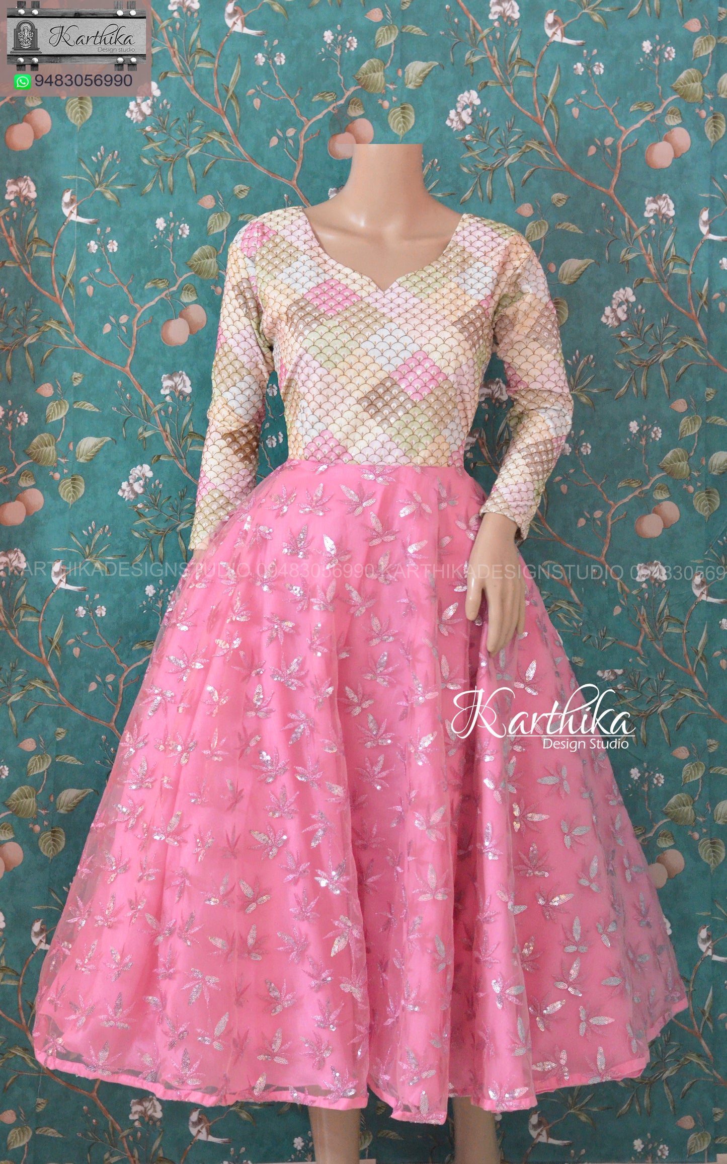 White and pink embroidered net frock.