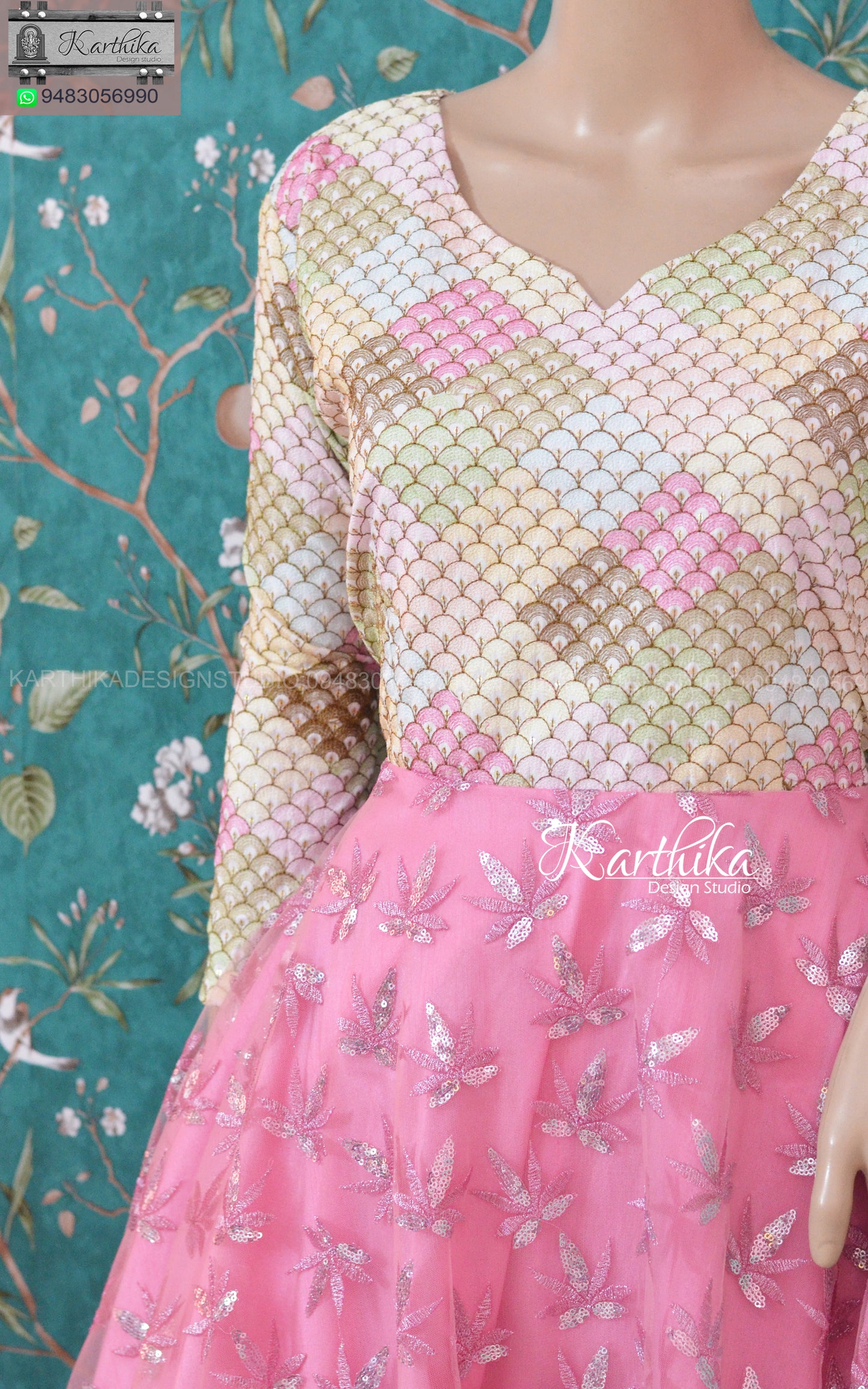 White and pink embroidered net frock.