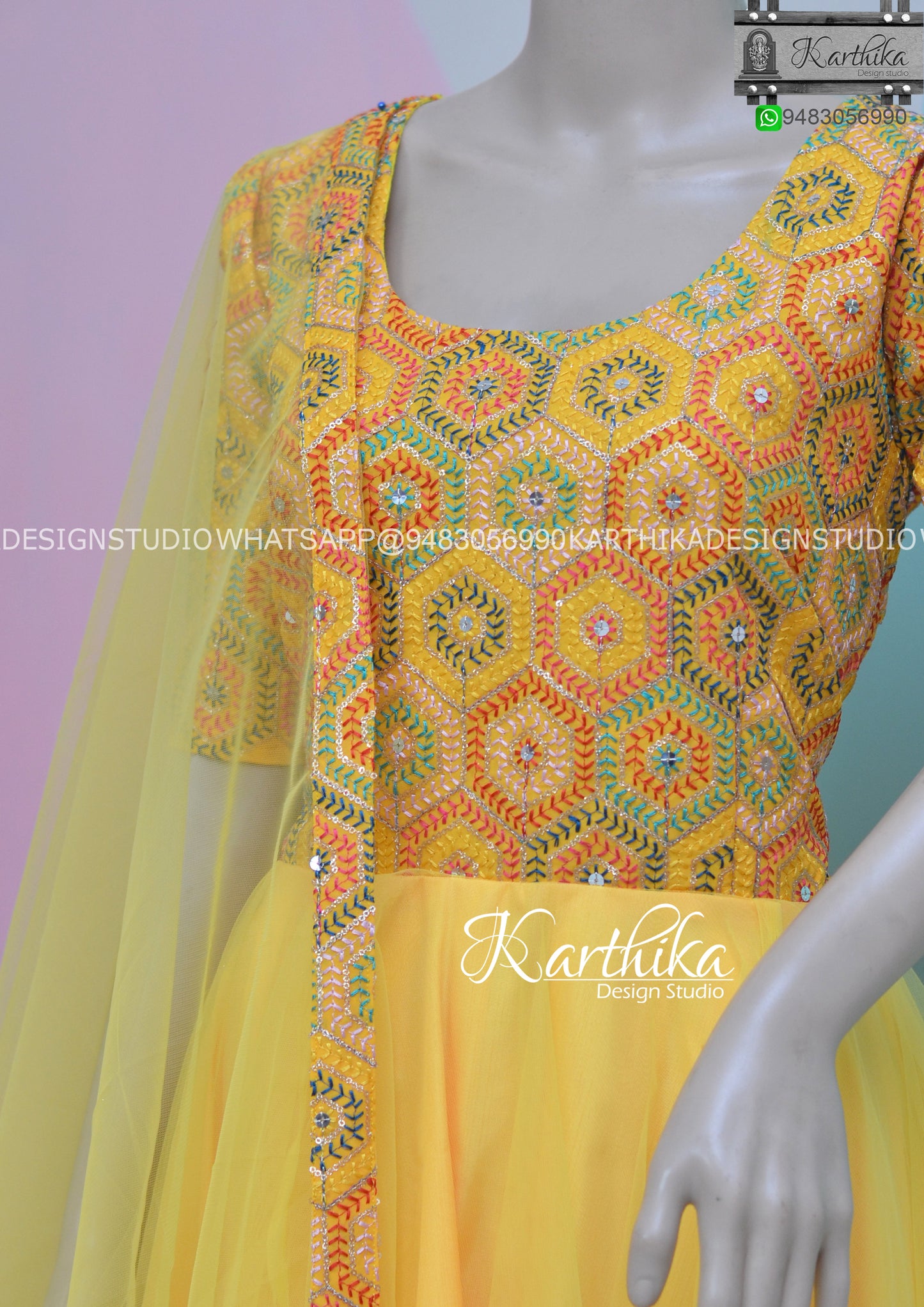 Yellow embroidered georgette long gown..