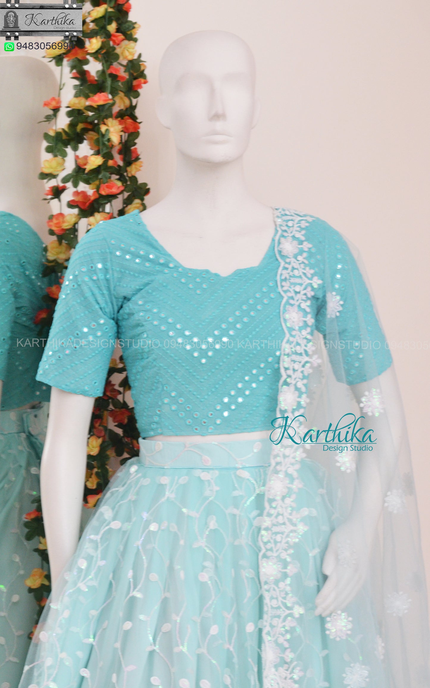 Embroidered net lehenga..