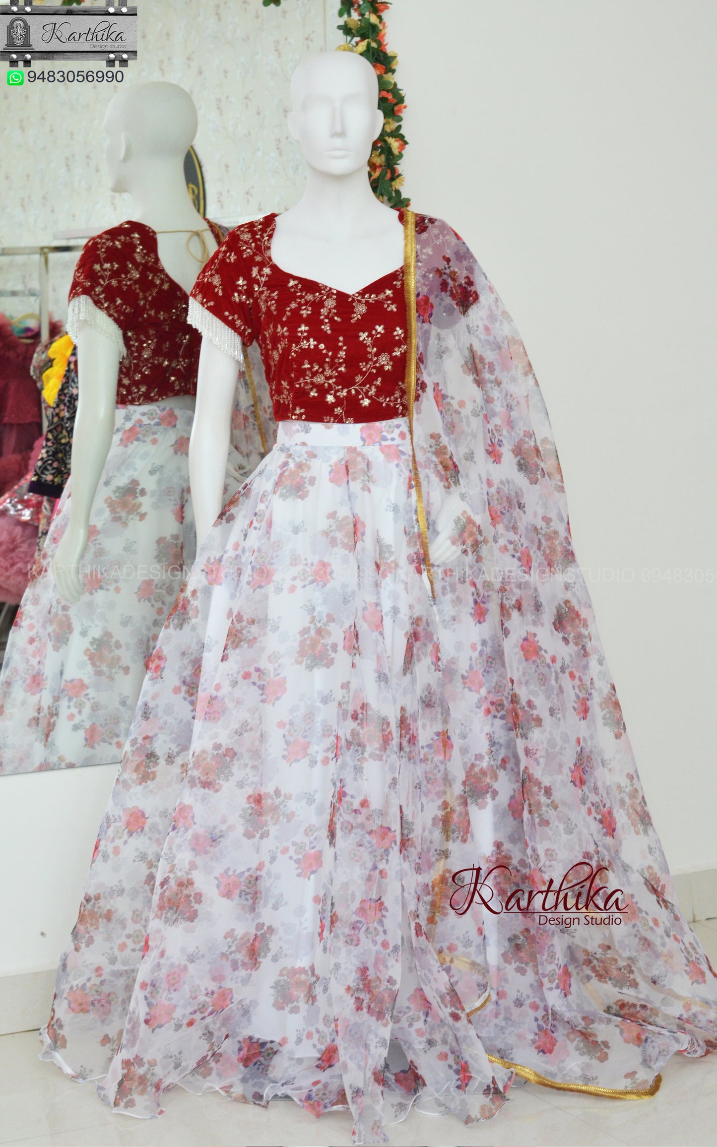 Embroidered velvet blouse with Floral organza lehenga..