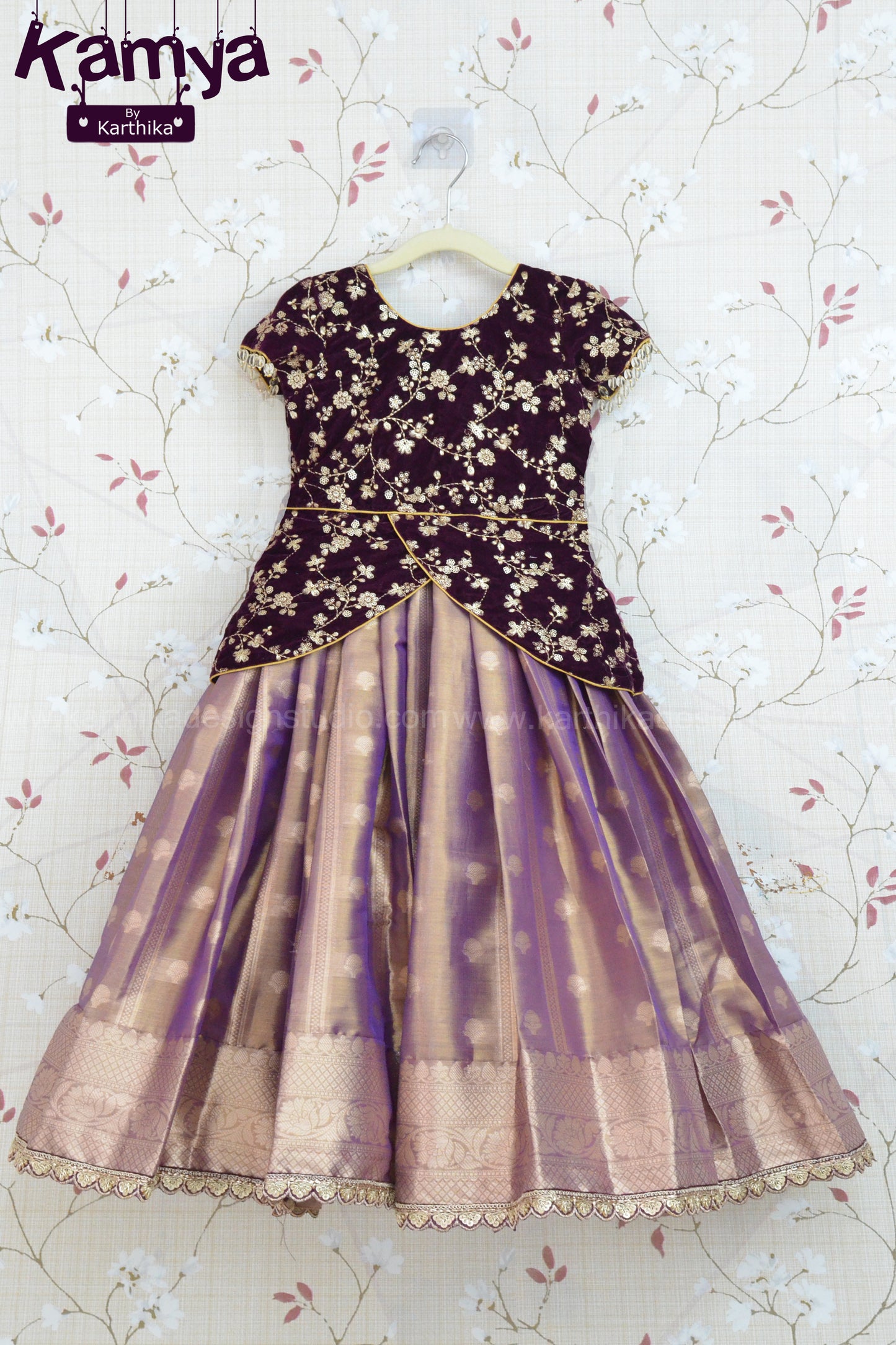 Embroidered velvet blouse with soft tissue lehenga