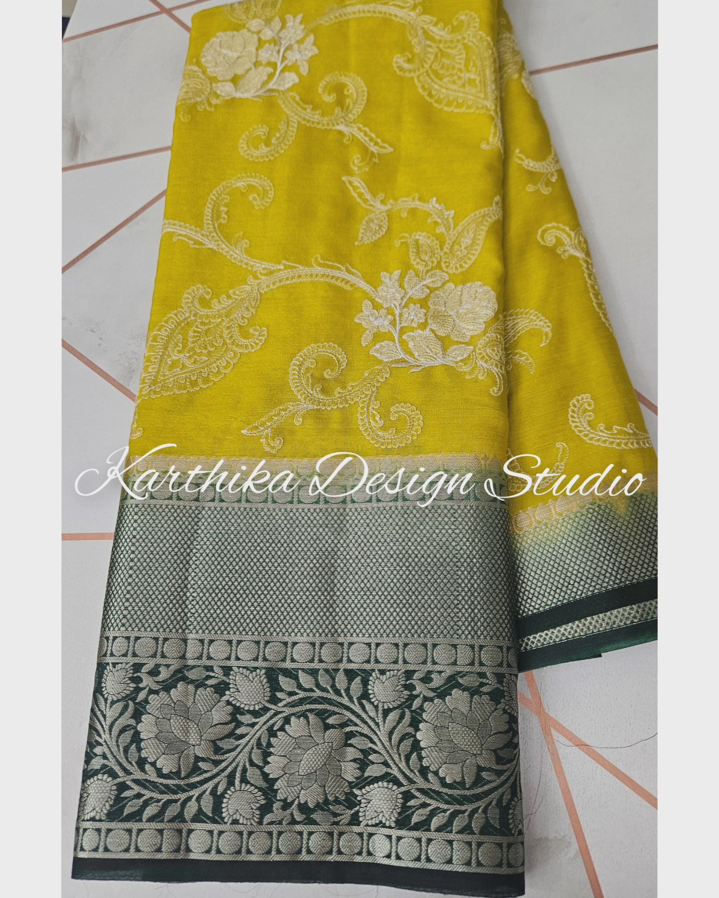 Elegant thread embroidered zari border saree