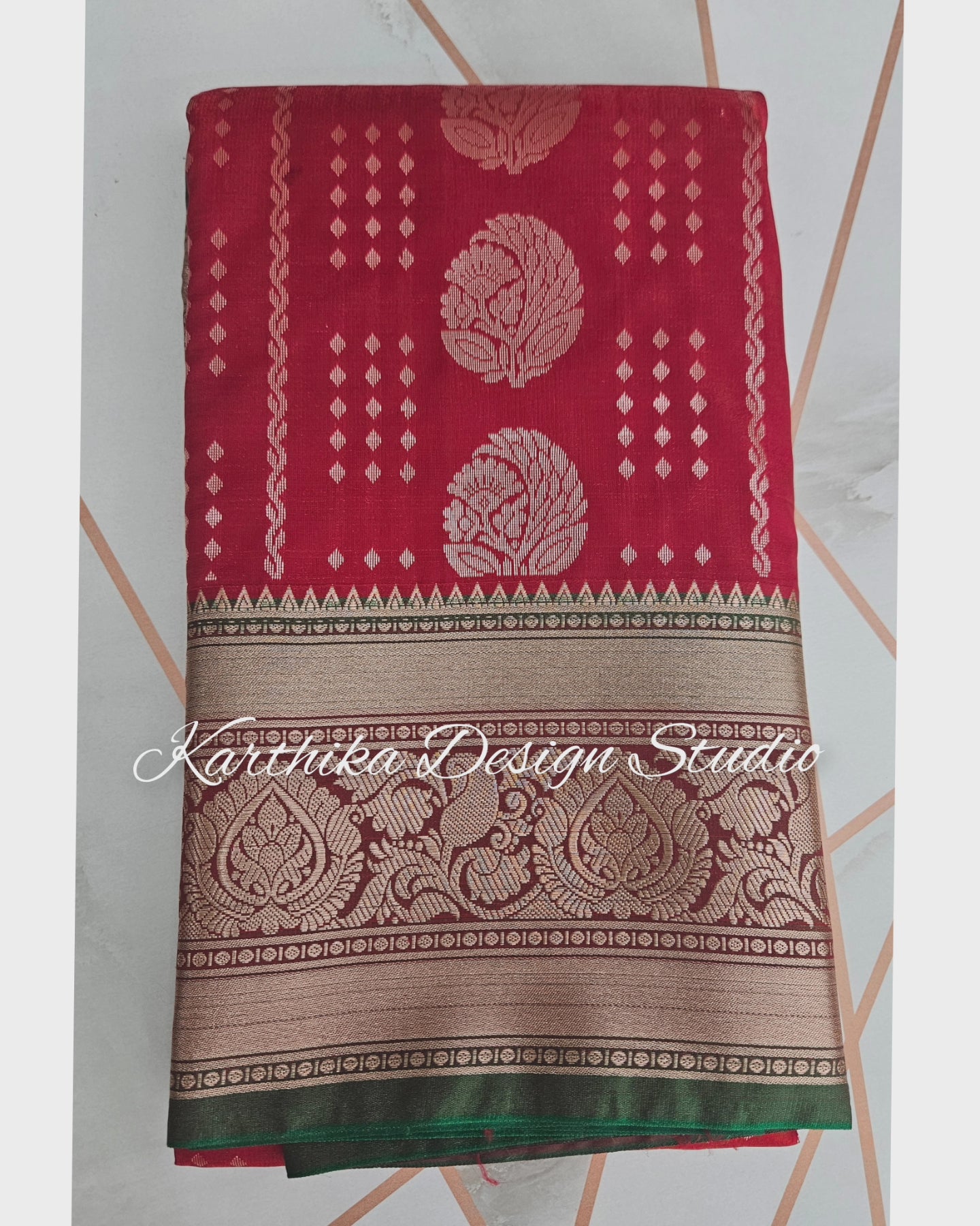 Bright red and green silk saree