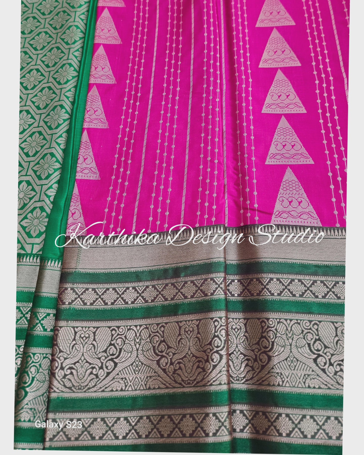 Bright pink and green silk saree