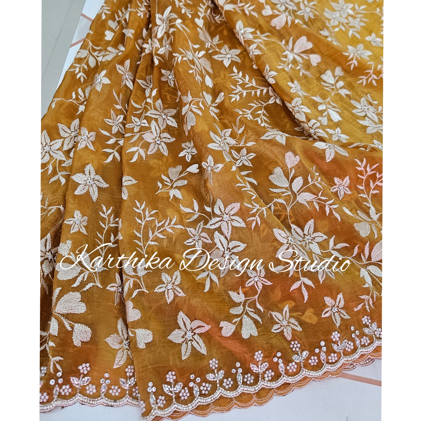 Mustard yellow Jimmychoo saree with cutwork border and overall embroidery