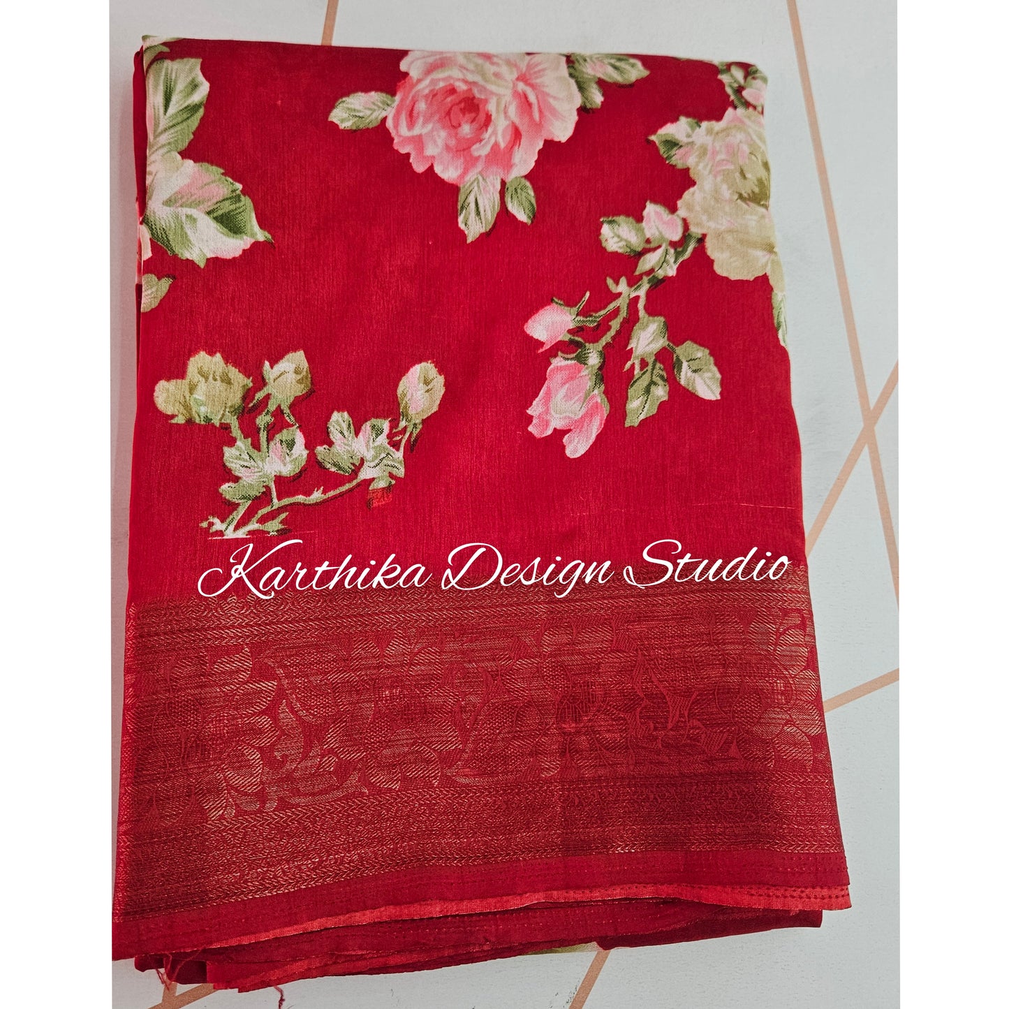 Red floral cotton jute saree with zari border