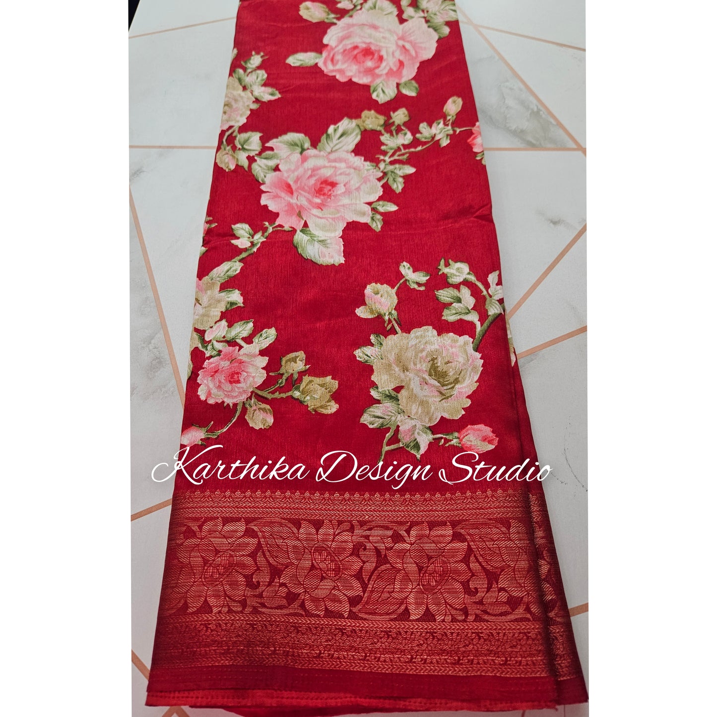 Red floral cotton jute saree with zari border
