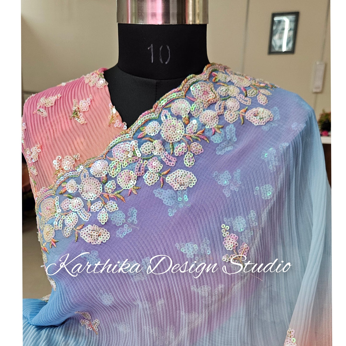 Crushed georgette saree with sequin embroidered border