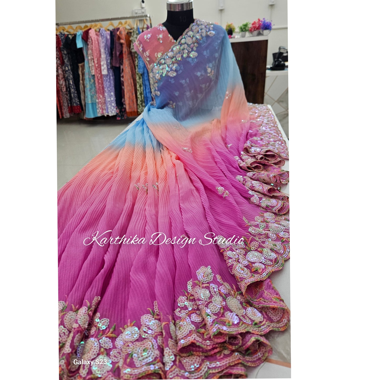 Crushed georgette saree with sequin embroidered border