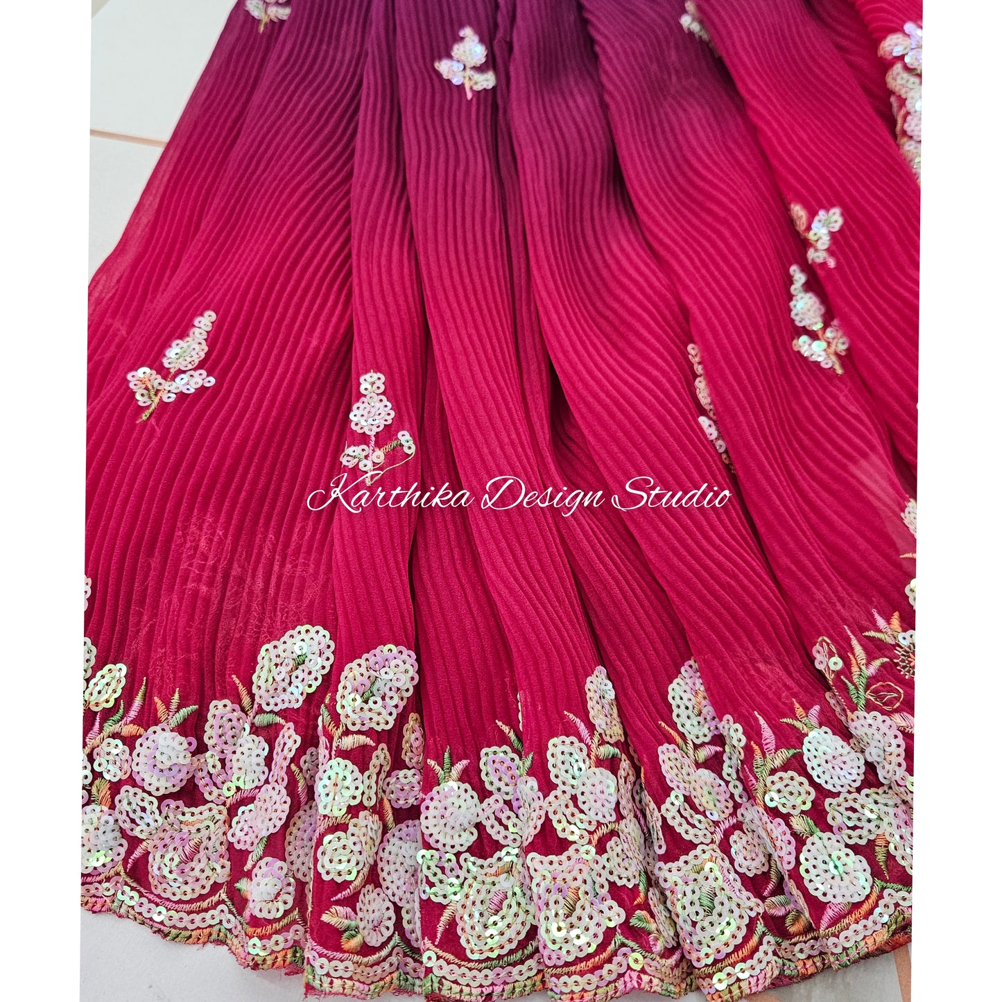 Crushed georgette saree with sequin embroidered border