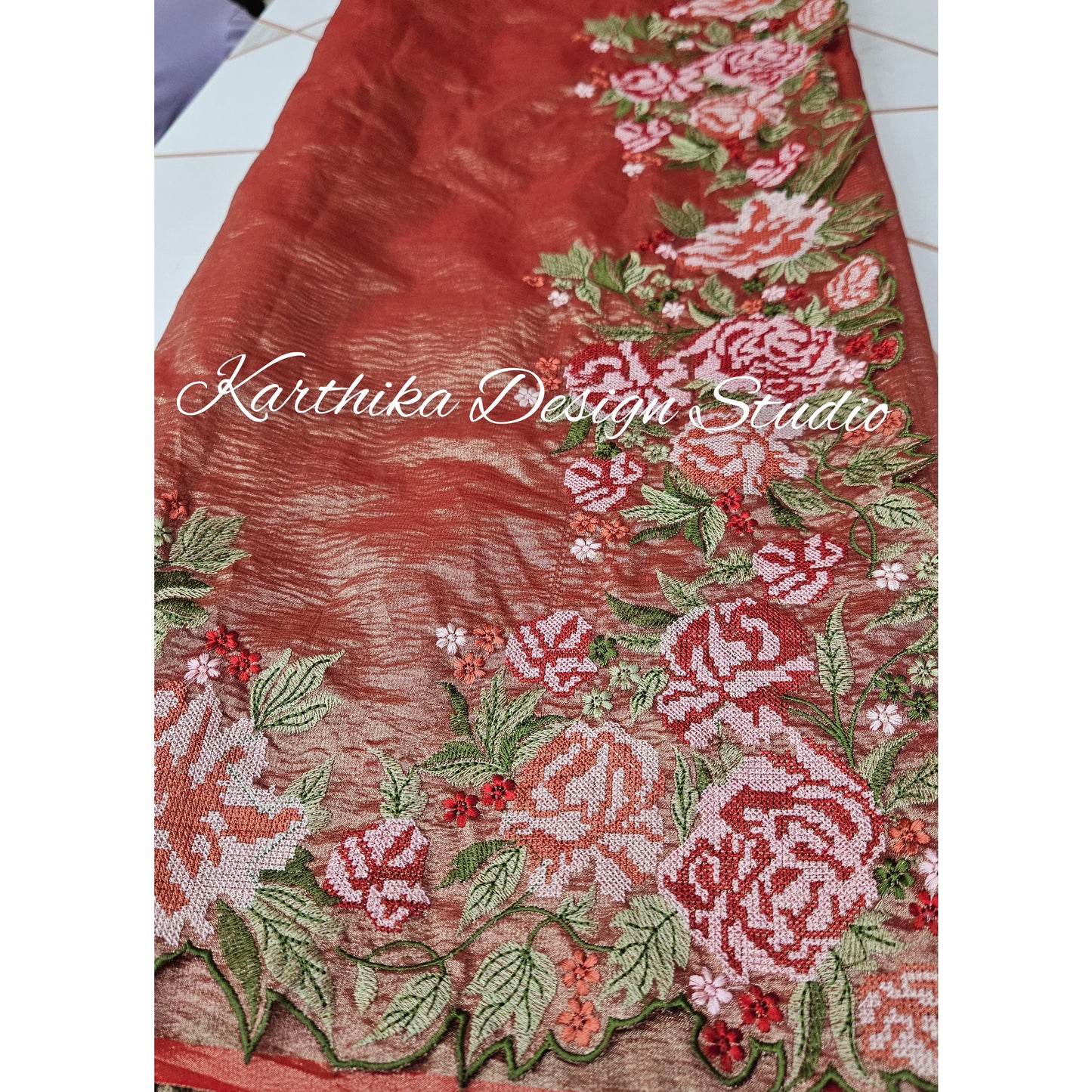 Crushed tissue saree with embroidered border