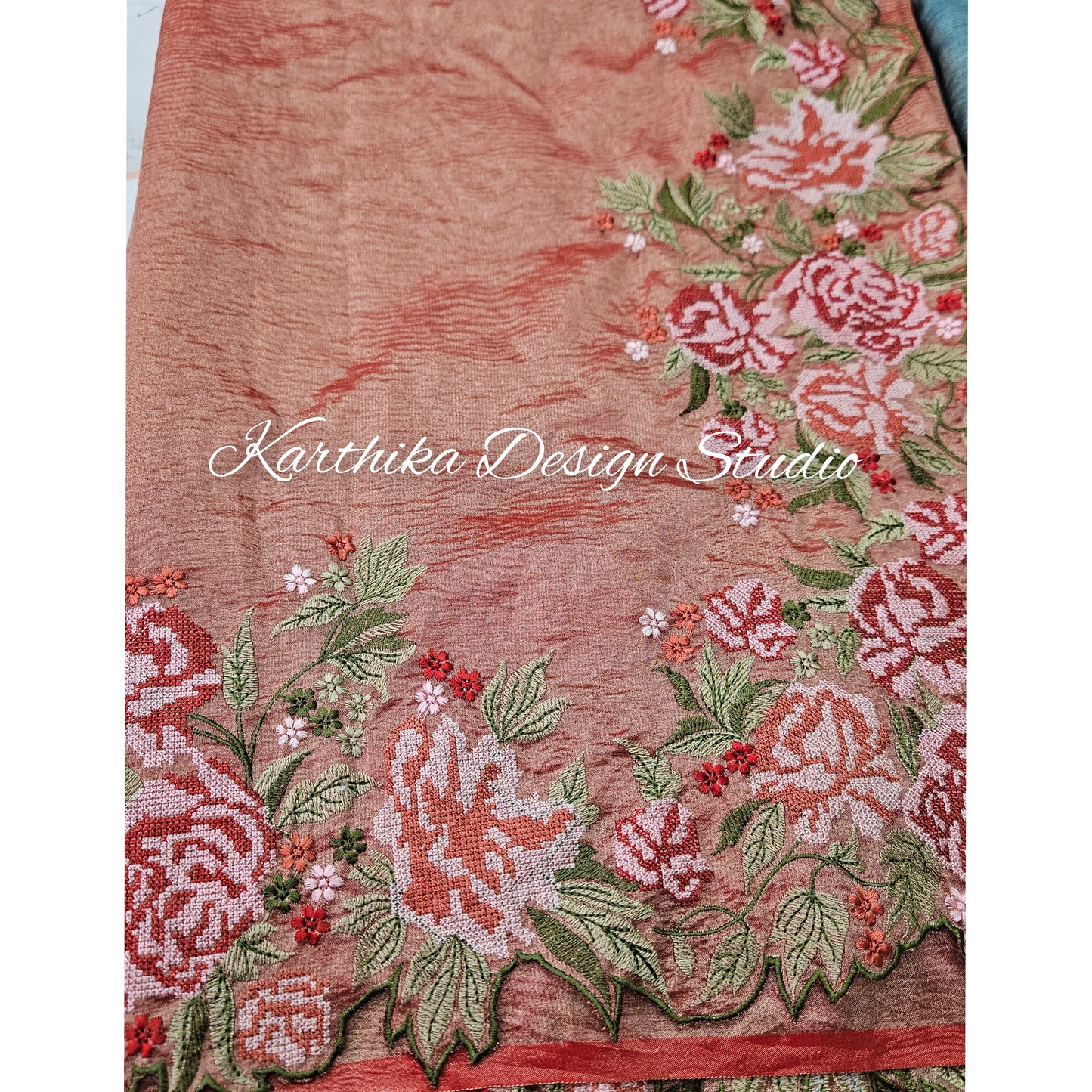 Crushed tissue saree with embroidered border