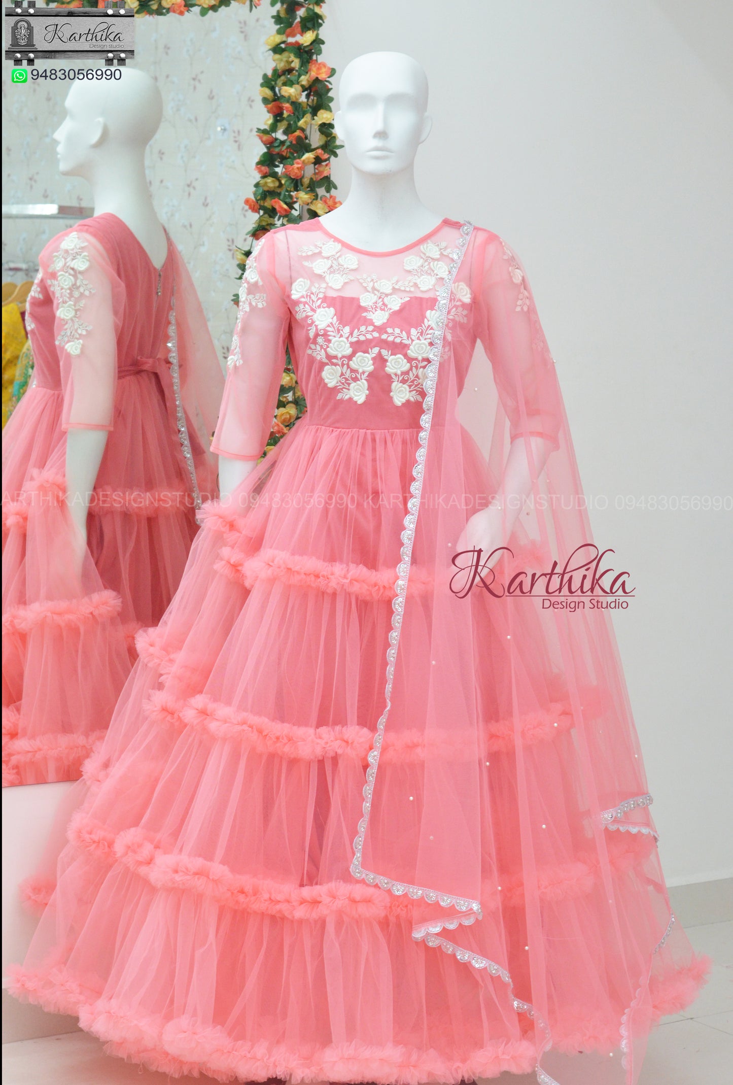Embroidered peach net long gown..