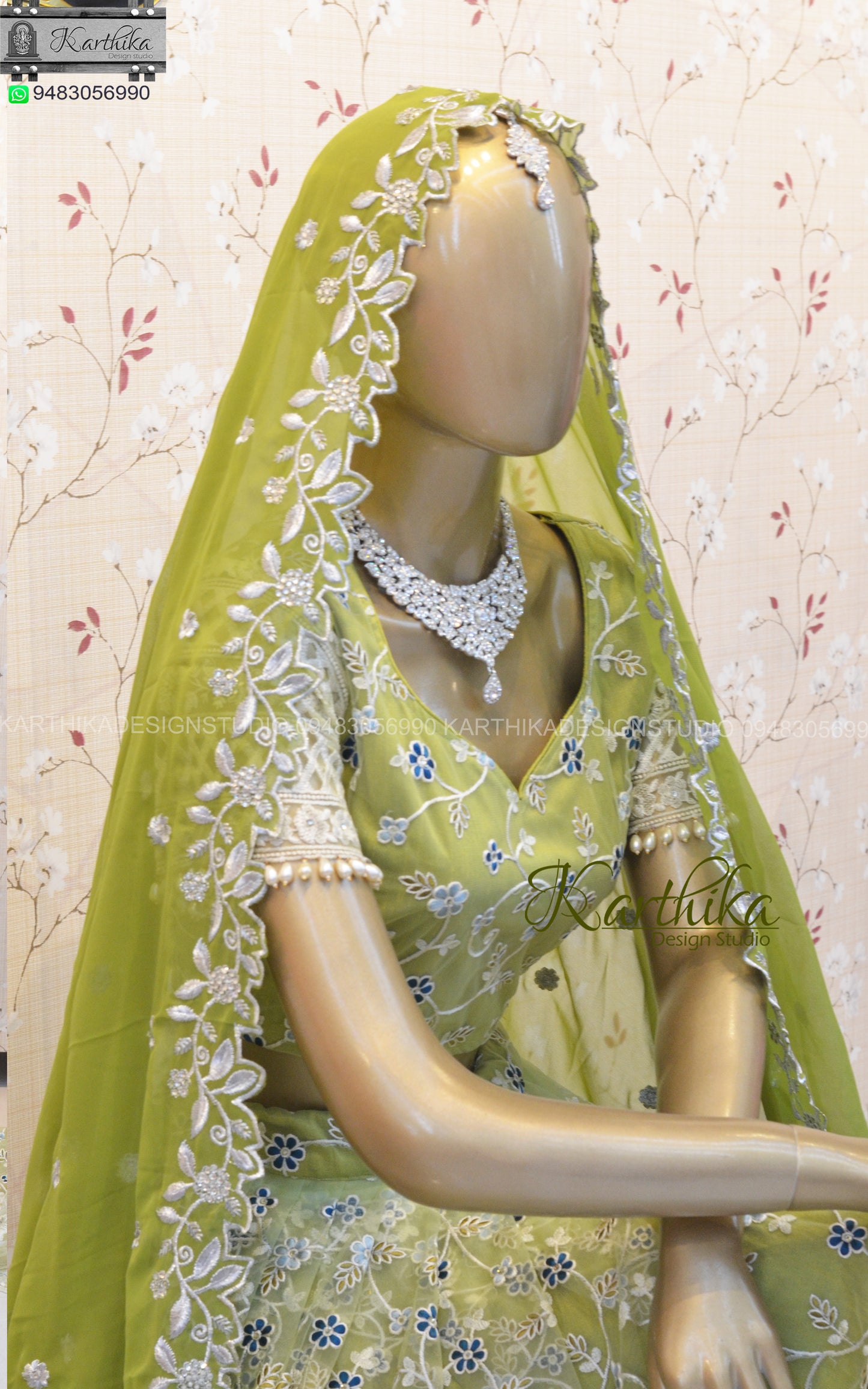 Olive green embroidered net lehenga