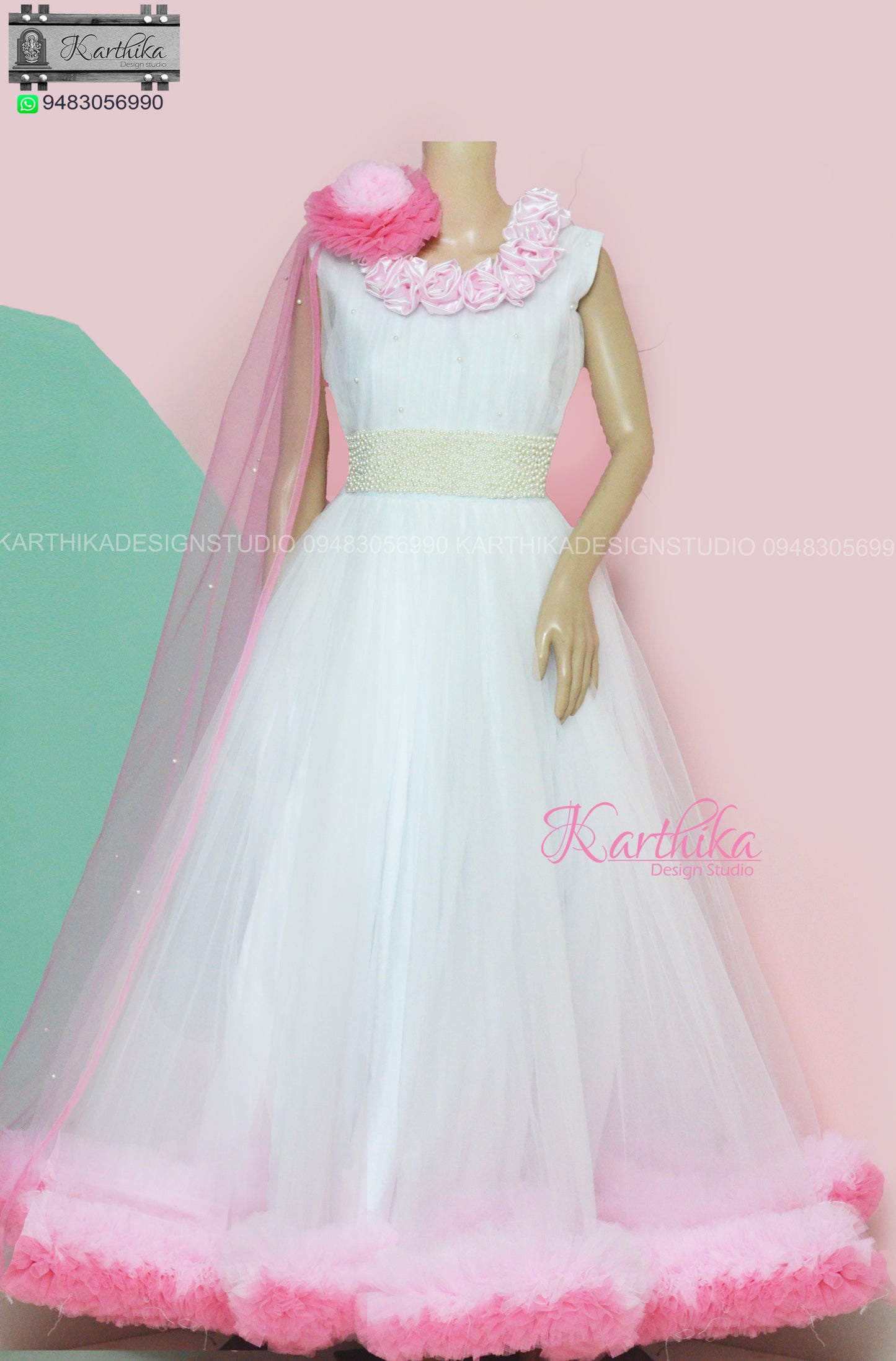 Pearl Embroidered White net long gown..