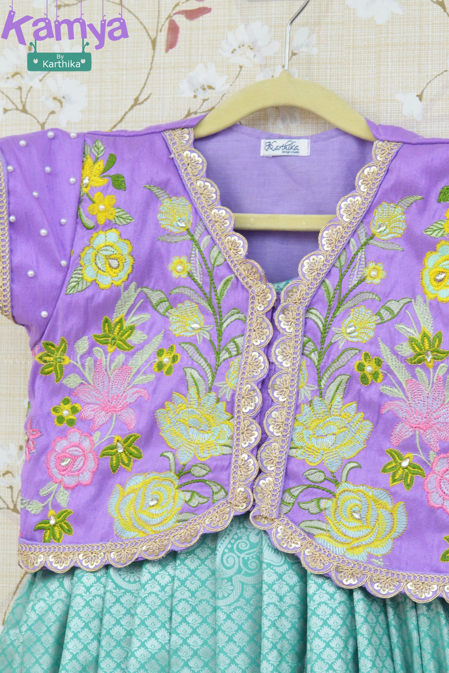 Soft silk lehenga with embroidered coat