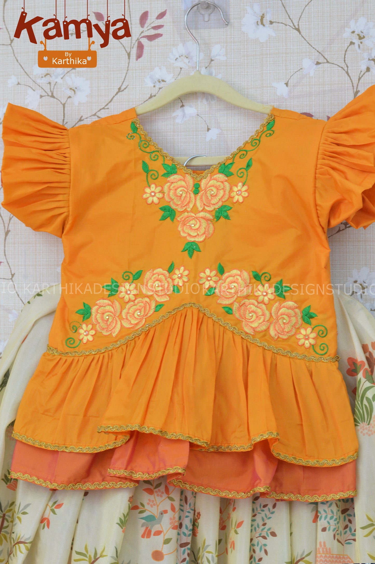 Tissue silk lehenga with raw silk blouse