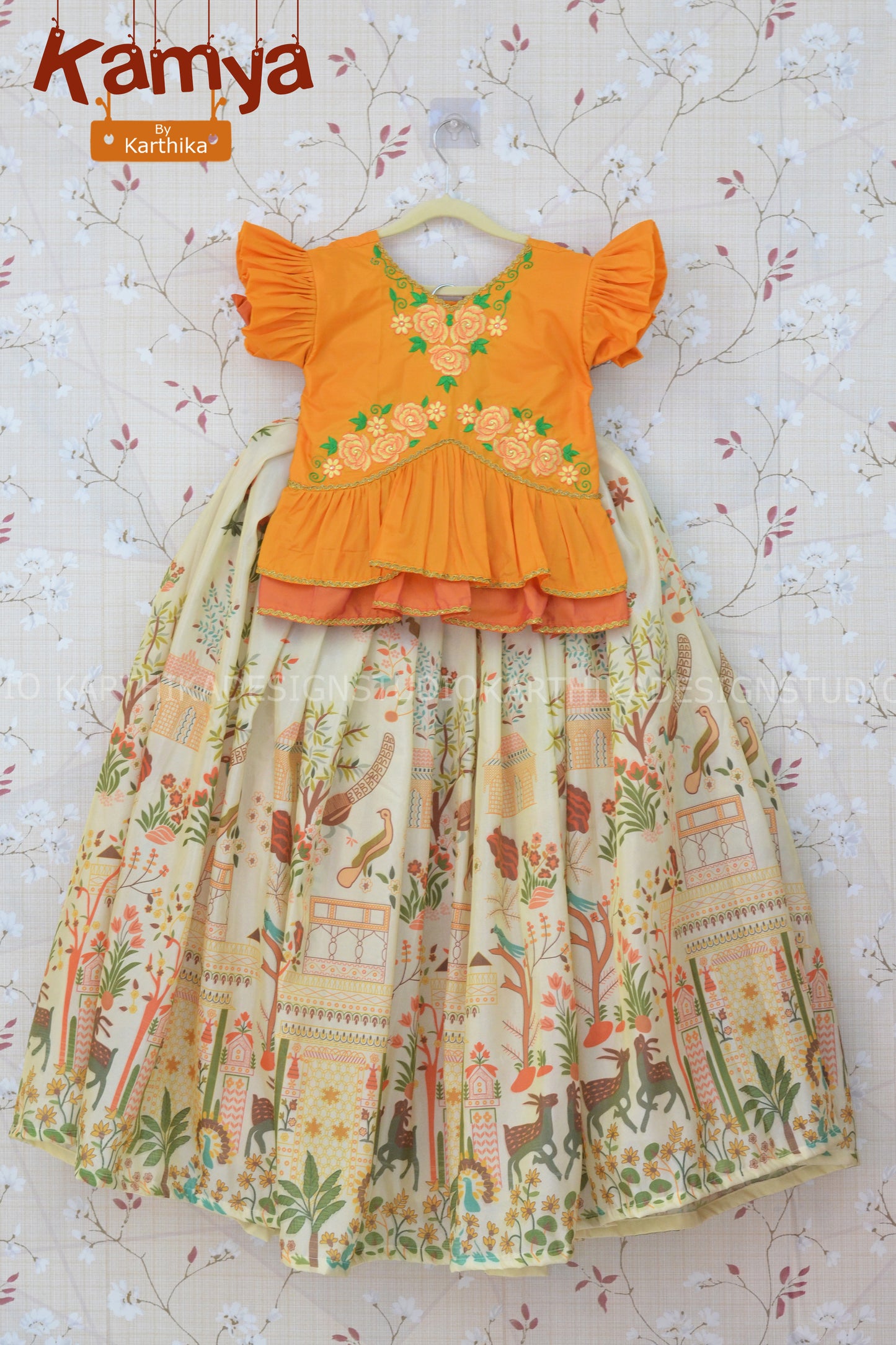 Tissue silk lehenga with raw silk blouse