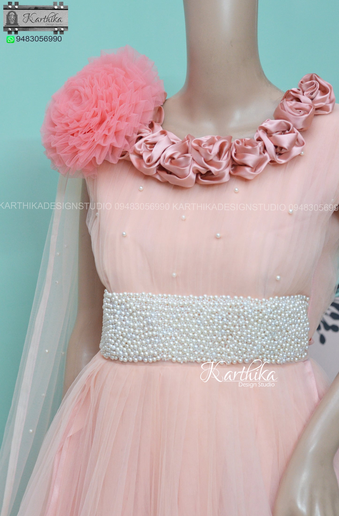 Pearl Embroidered White net long gown..