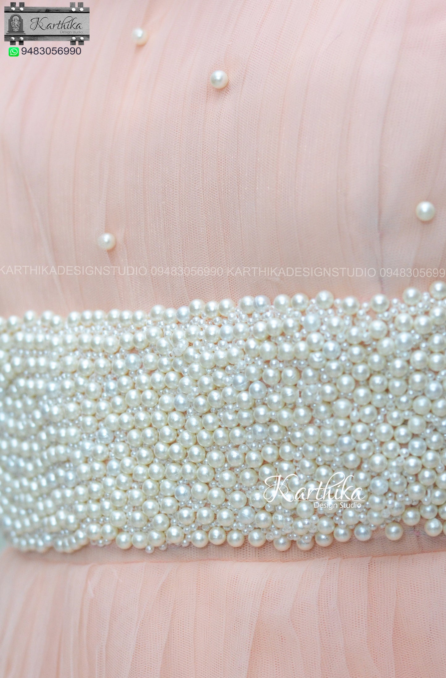 Pearl Embroidered White net long gown..