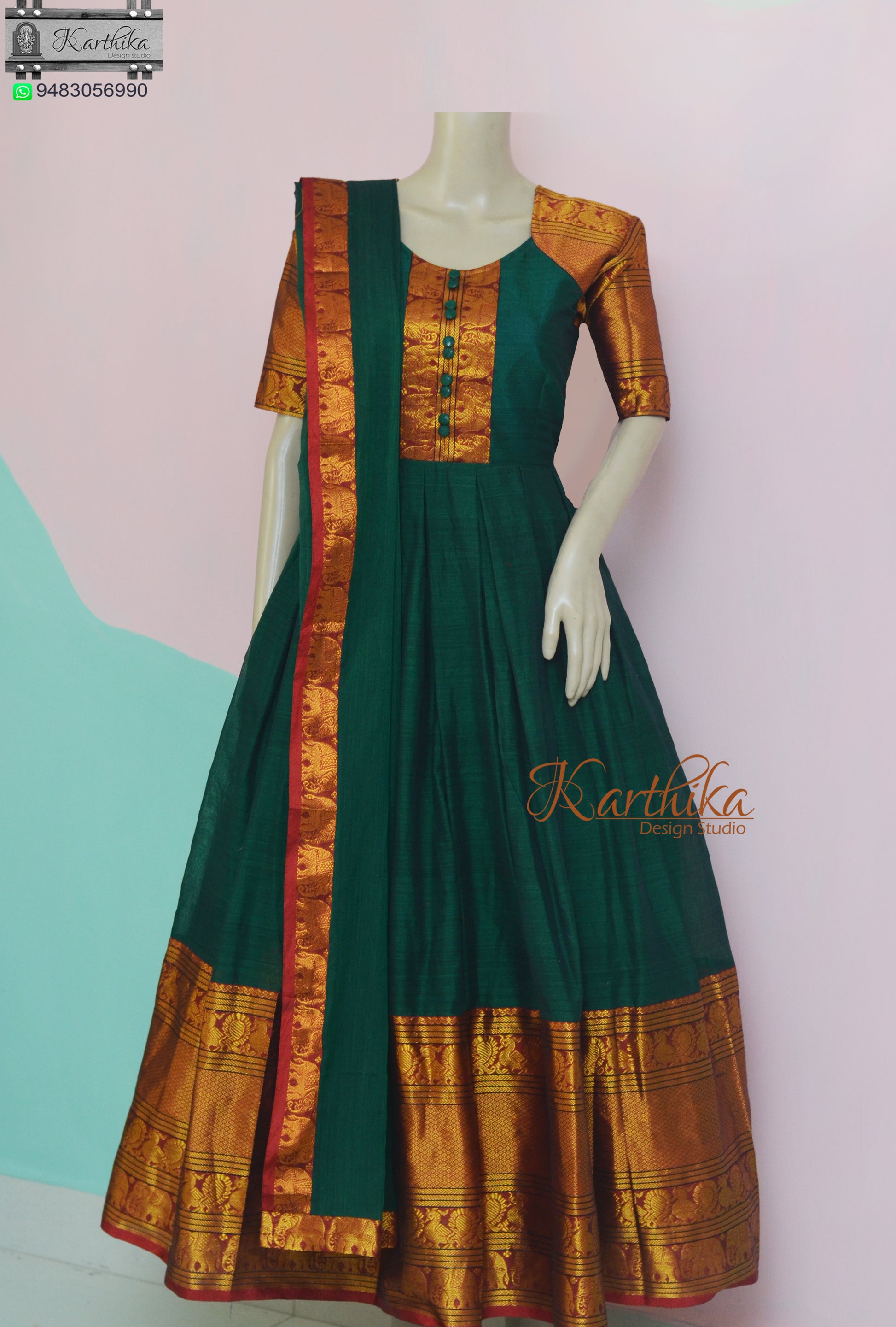 Bottle green Narayanpet cotton long gown.. karthika design studio Bottle green Narayanpet cotton long gown.. karthika design studio
