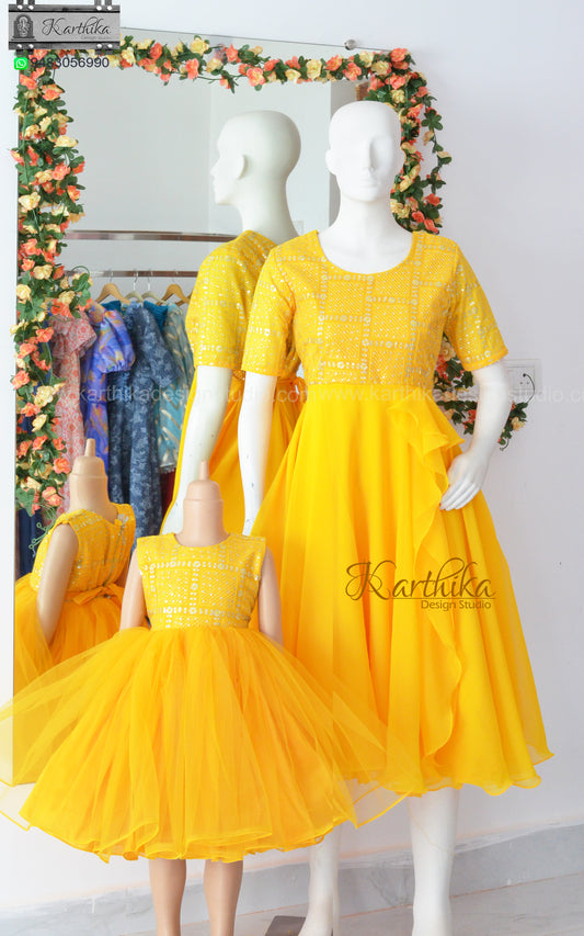 Yellow embroidered net/georgette frock