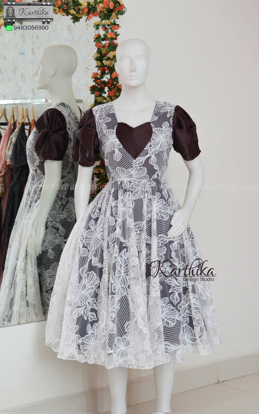 Embroidered net and satin frock