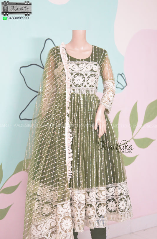 Bottle green embroidered net chudidhar