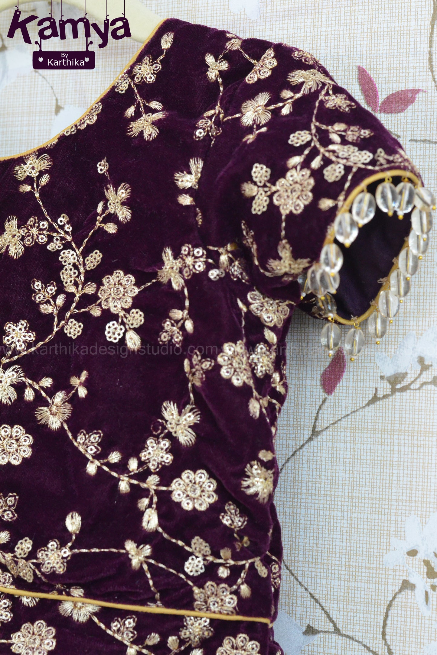 Embroidered velvet blouse with soft tissue lehenga