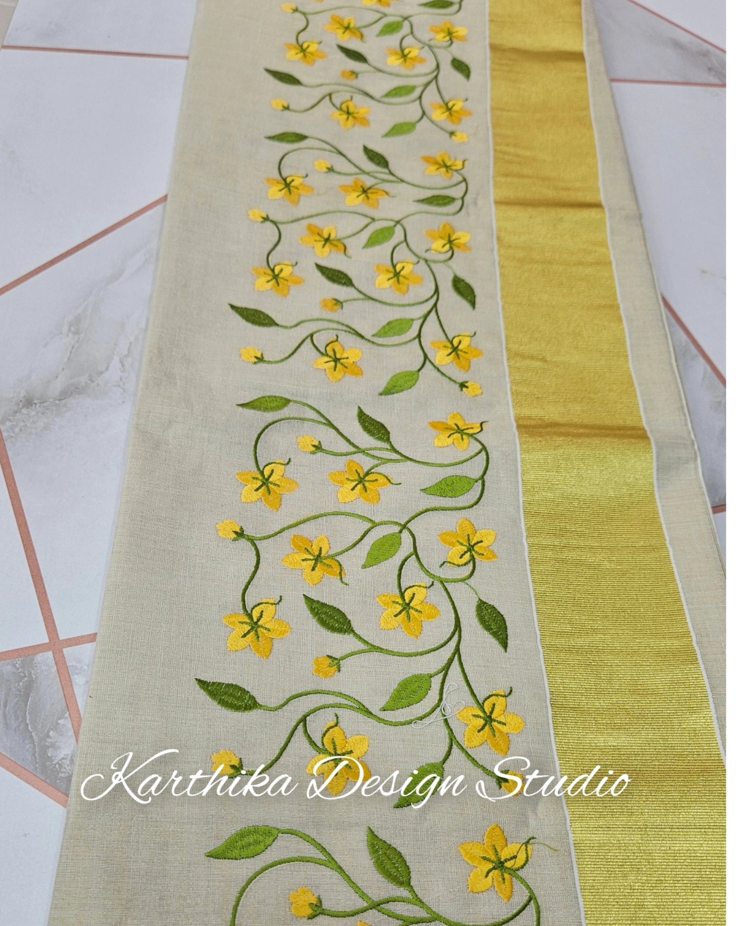 Kasavu saree with embroidery