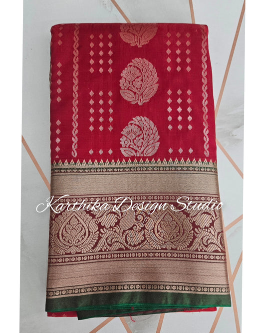 Bright red and green silk saree