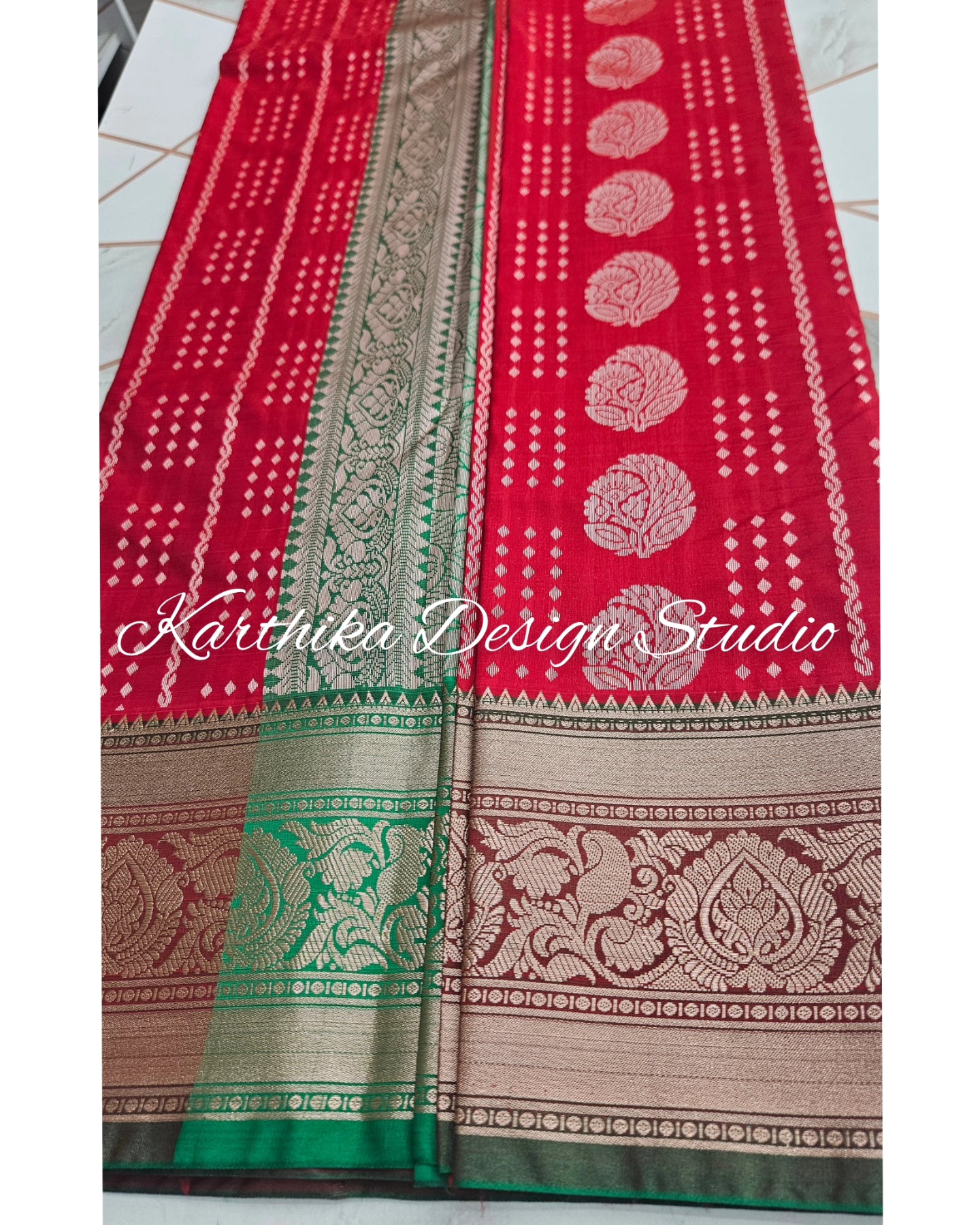 Bright red and green silk saree