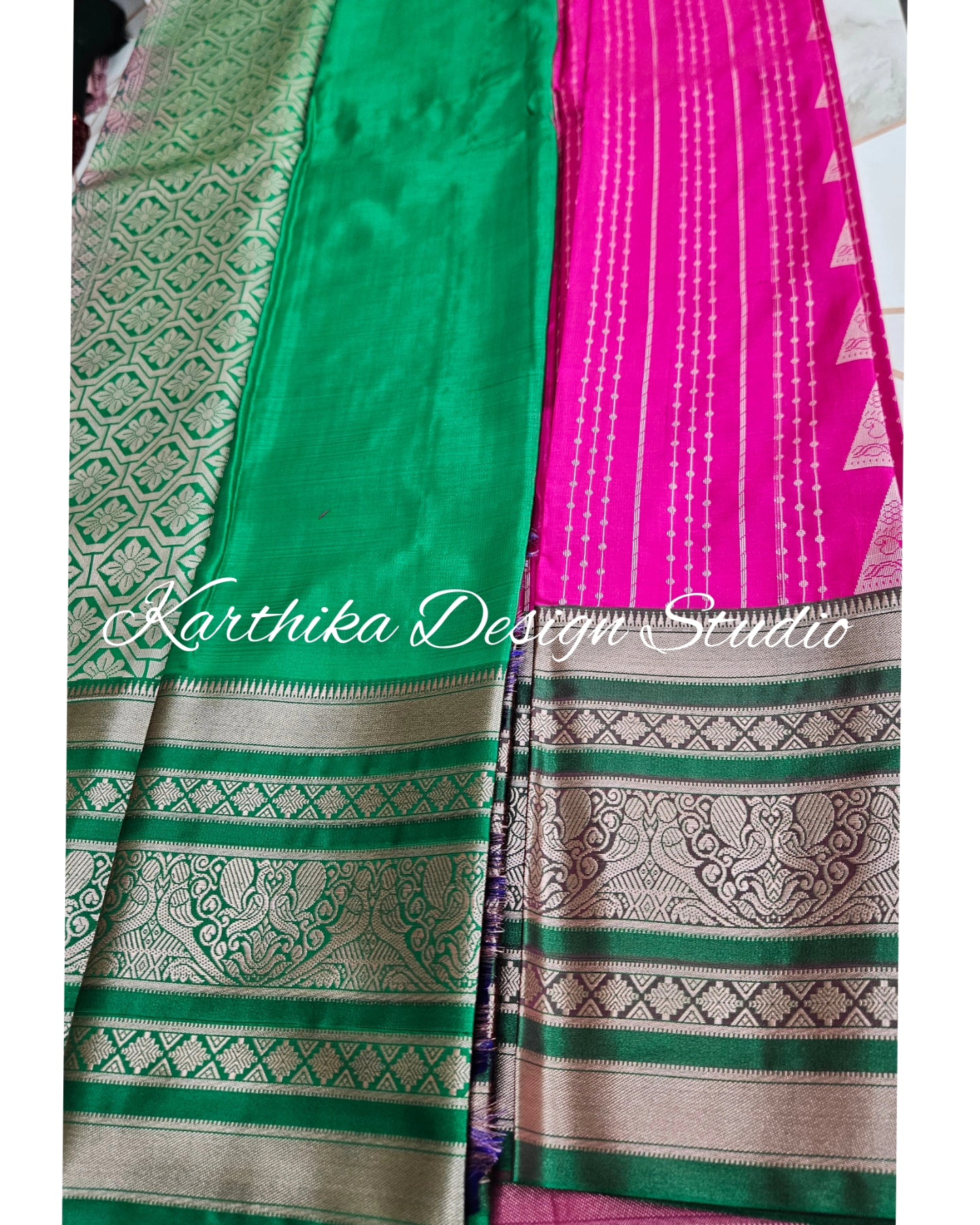 Bright pink and green silk saree