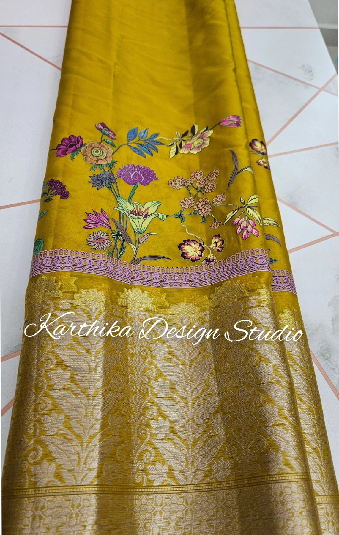 Embossed printed tissue saree with zari border