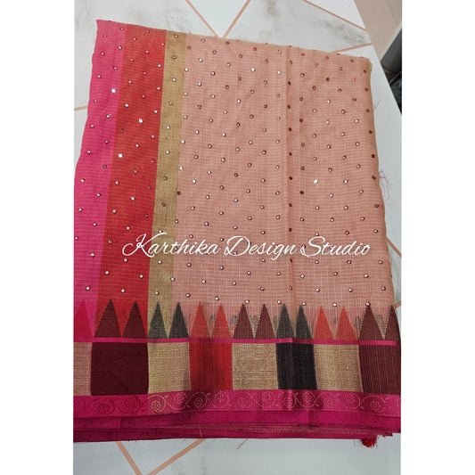 Cream Kota saree with temple border and mirror work