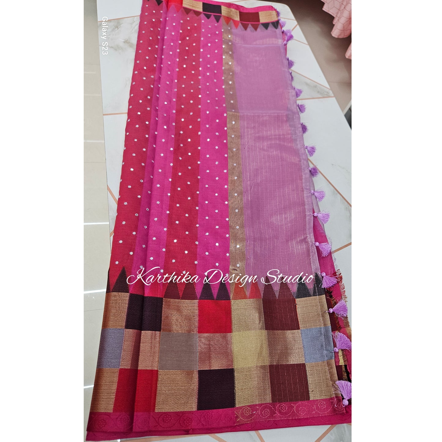 Lavender Kota saree with temple border and mirror work