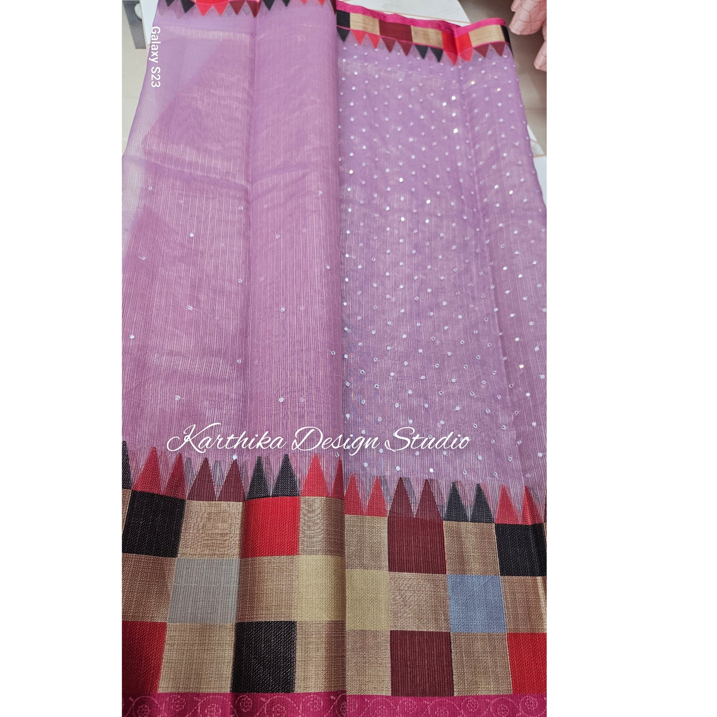 Lavender Kota saree with temple border and mirror work