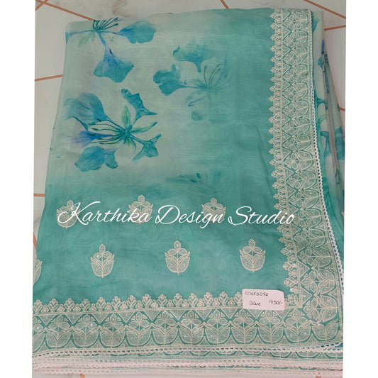 Sea green Floral georgette saree with embroidered border