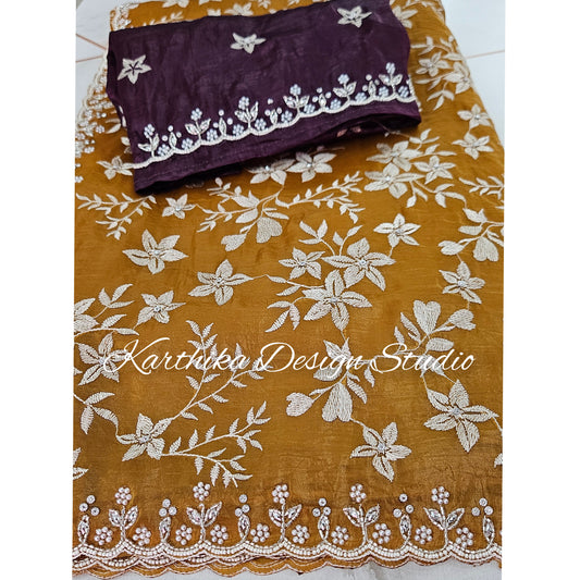Mustard yellow Jimmychoo saree with cutwork border and overall embroidery