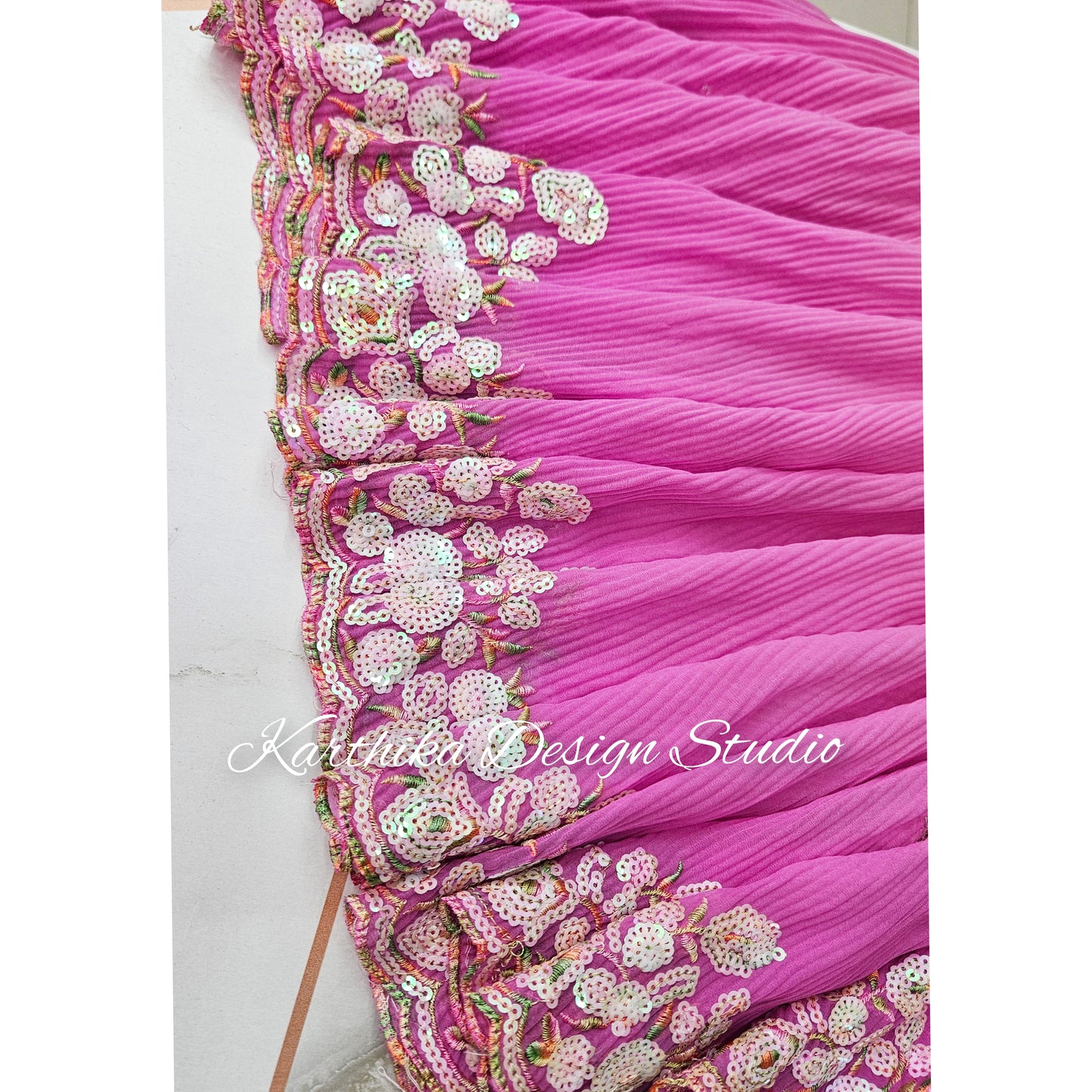 Crushed georgette saree with sequin embroidered border