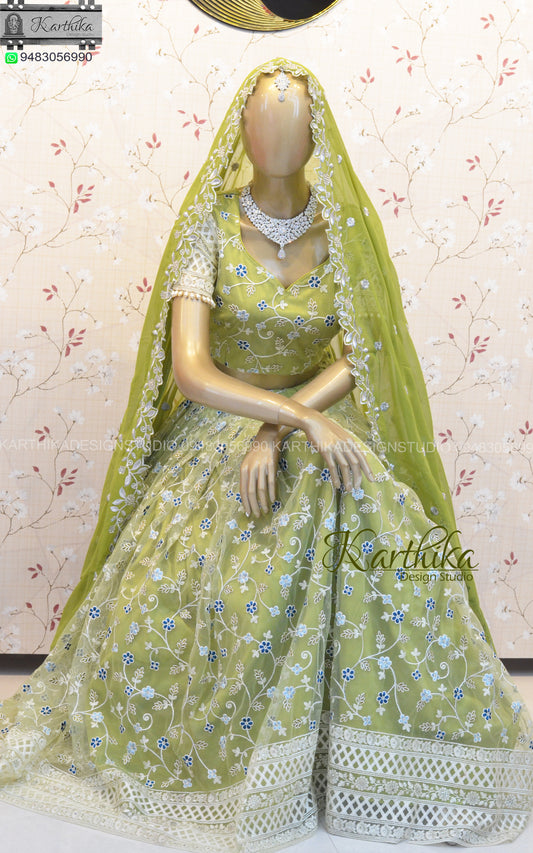 Olive green embroidered net lehenga