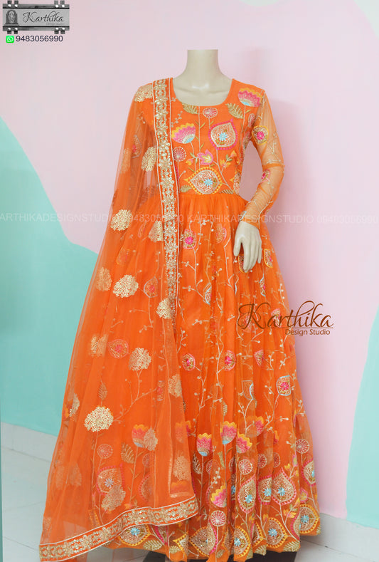 Orange embroidered net long gown..