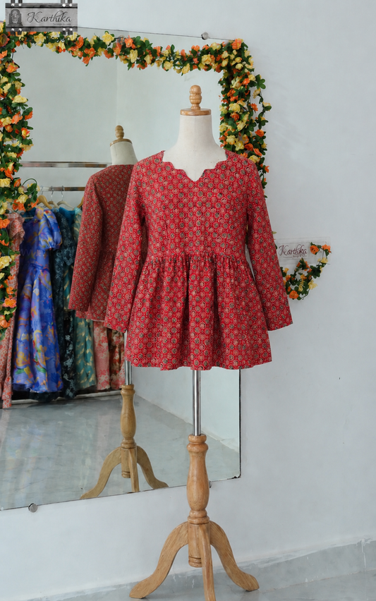 Printed cotton peplum tunic